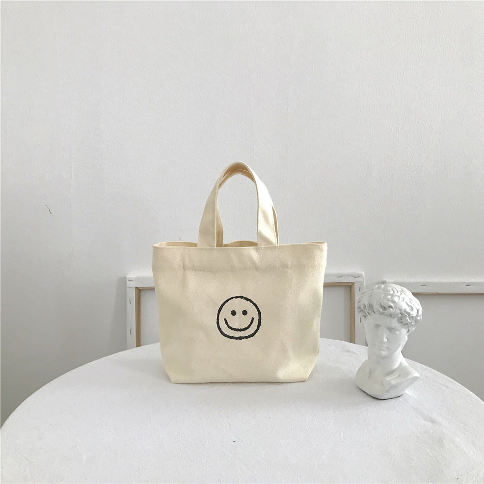 Women's Canvas Cute Smiley Face Simple Lunch Handbags