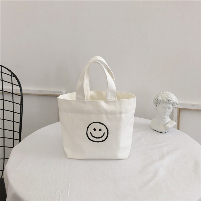 Women's Canvas Cute Smiley Face Simple Lunch Handbags
