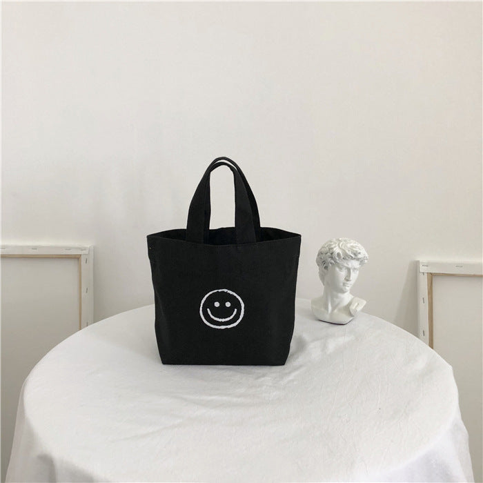 Women's Canvas Cute Smiley Face Simple Lunch Handbags