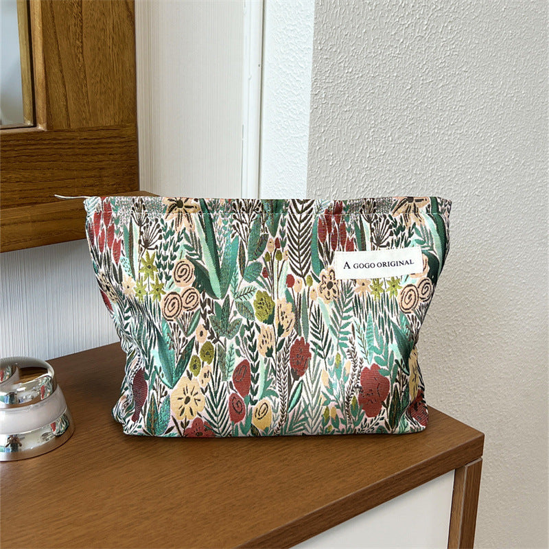 Elegant Artistic French Embossed Flower Simple Portable Mobile Walking Makeup Bag
