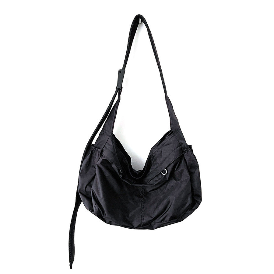 High-grade Nylon Dumpling Unisex Simple Style Crossbody Bags