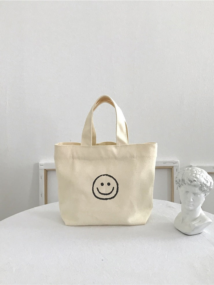 Women's Canvas Cute Smiley Face Simple Lunch Handbags