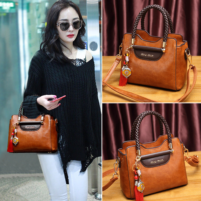 Women's Genuine Leather Fashionable Cowhide Elegant Handbags