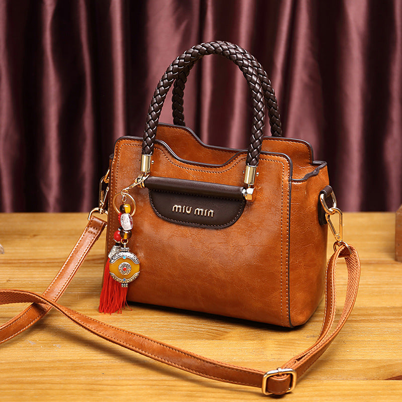 Women's Genuine Leather Fashionable Cowhide Elegant Handbags