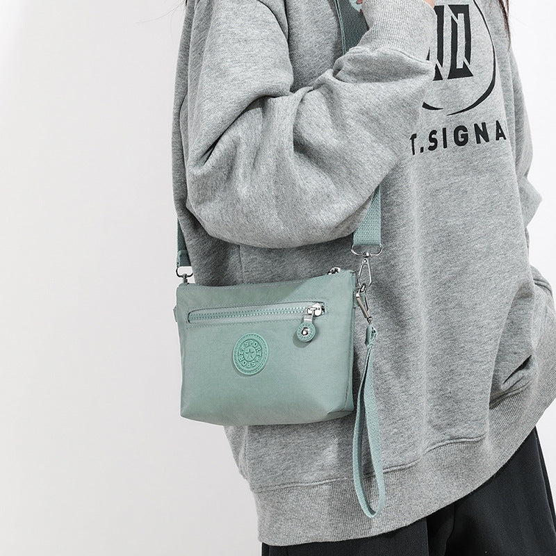 Women's Mobile Mini Trendy High-grade Canvas Wrist Women's Messenger Bag