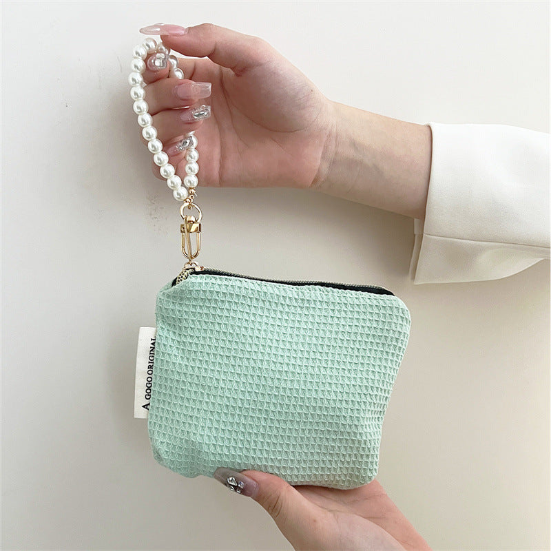 Niche Hand Carrying Earphone Sanitary Napkin Storage Portable Makeup Bag