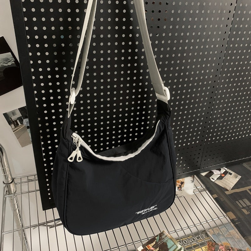 Women's & Men's Simple Lightweight Tide Back Difference Women's Shoulder Bag