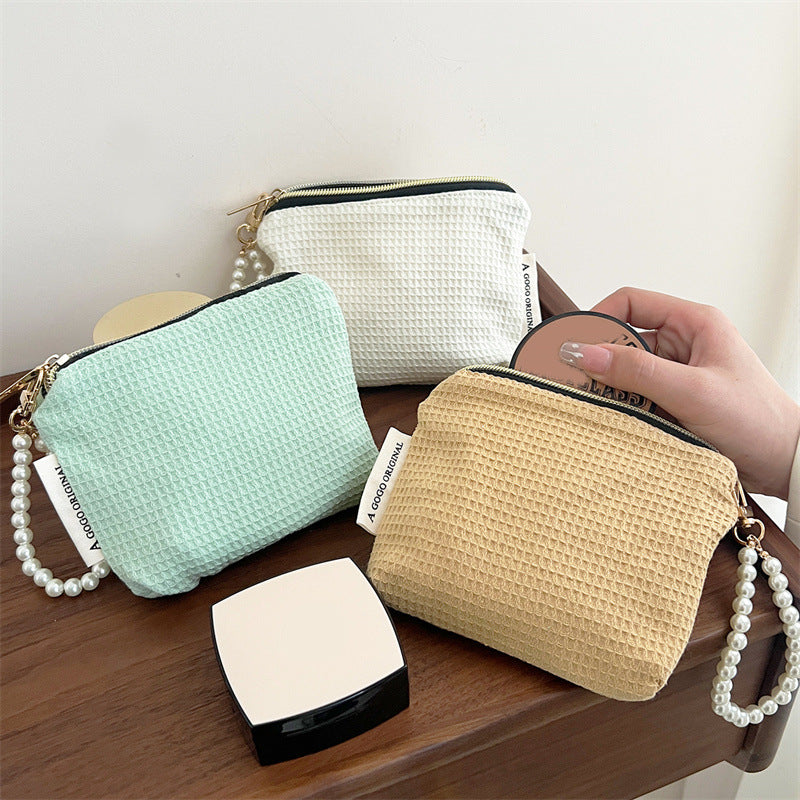 Niche Hand Carrying Earphone Sanitary Napkin Storage Portable Makeup Bag