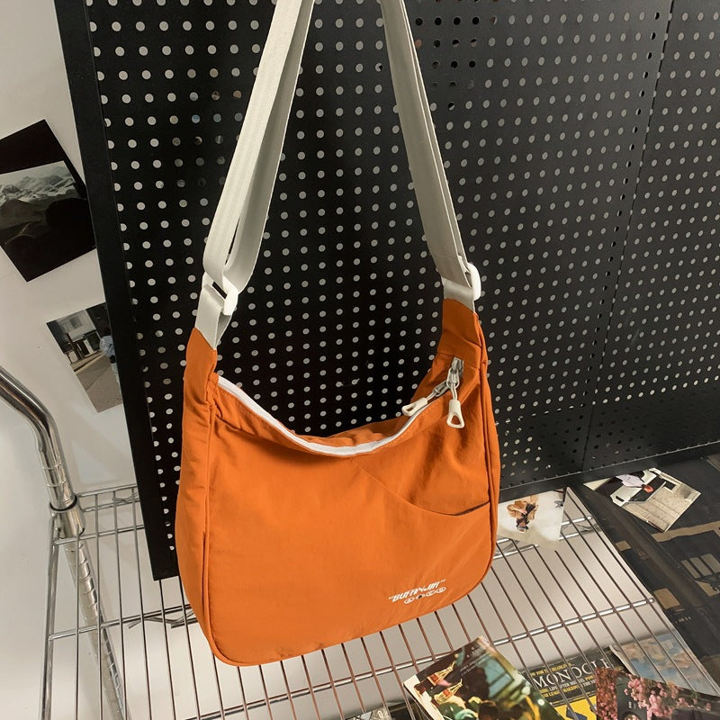 Women's & Men's Simple Lightweight Tide Back Difference Women's Shoulder Bag
