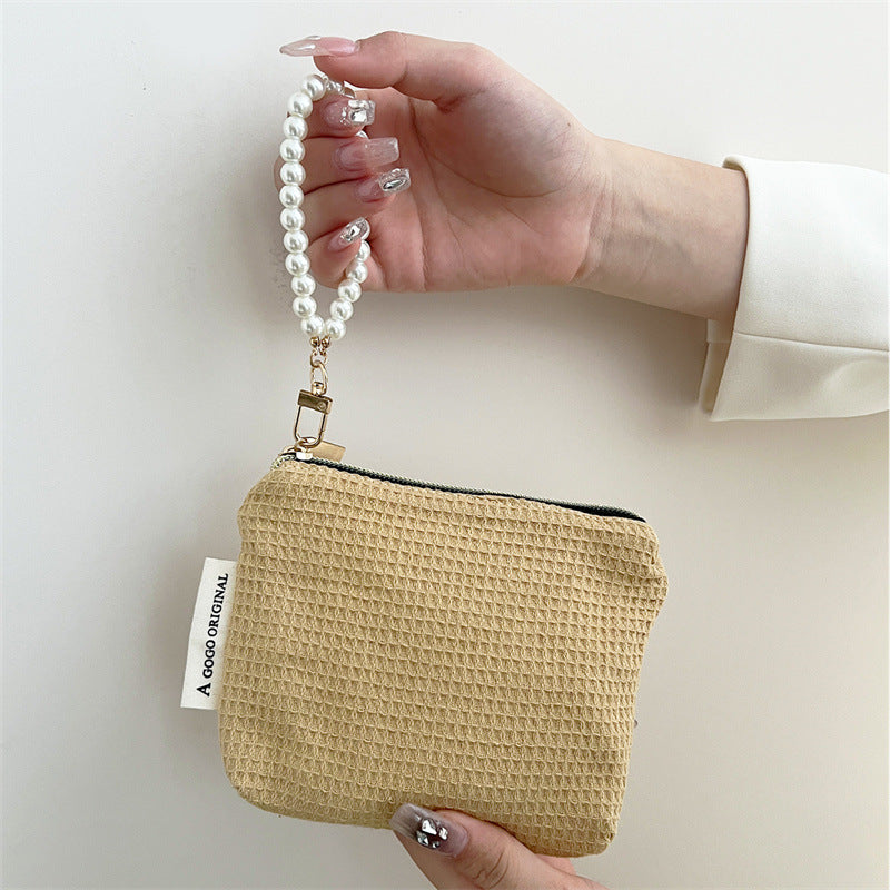 Niche Hand Carrying Earphone Sanitary Napkin Storage Portable Makeup Bag