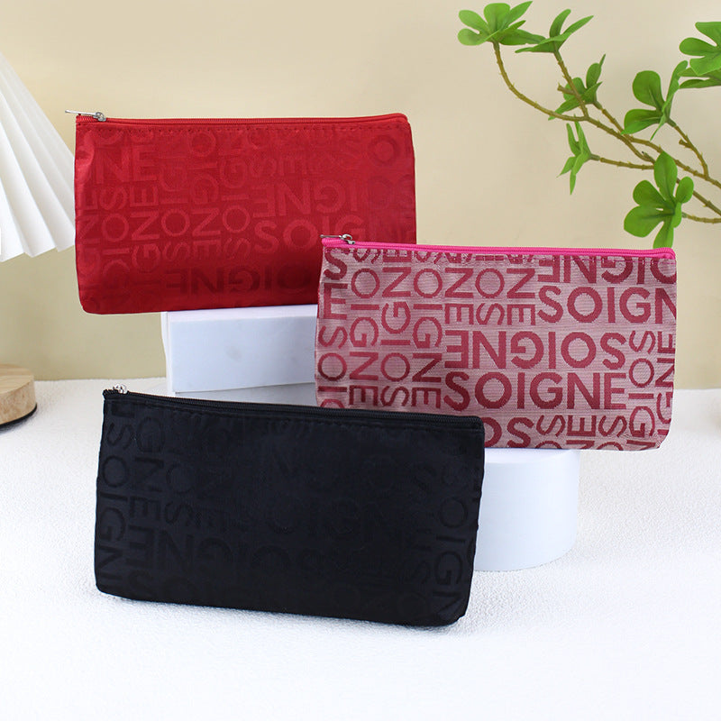 Women's Korean Leisure Letter Jacquard Horizontal Hand-held Cosmetic Bags
