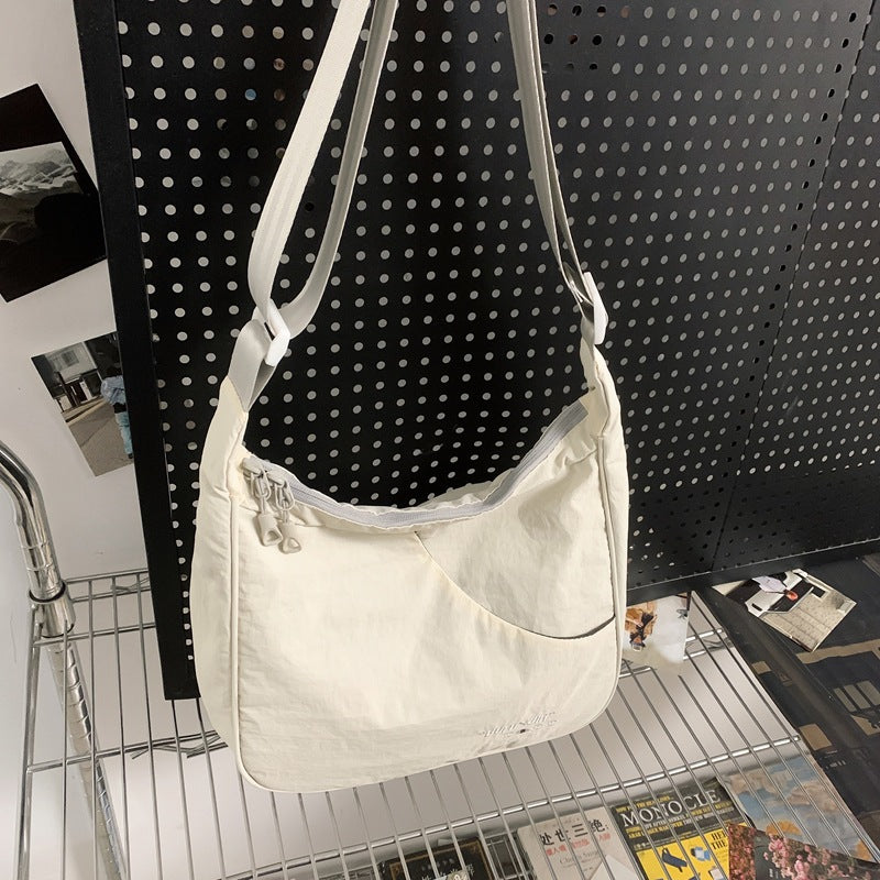 Women's & Men's Simple Lightweight Tide Back Difference Women's Shoulder Bag