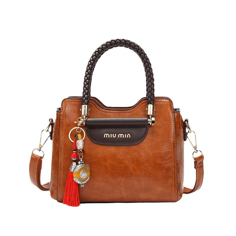 Women's Genuine Leather Fashionable Cowhide Elegant Handbags