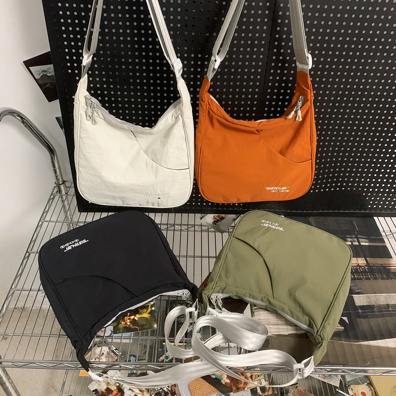 Women's & Men's Simple Lightweight Tide Back Difference Women's Shoulder Bag
