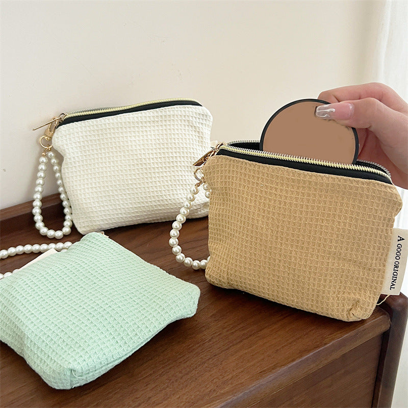Niche Hand Carrying Earphone Sanitary Napkin Storage Portable Makeup Bag