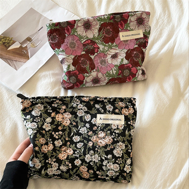 High-grade Artistic Jacquard Lady's Flower Clutch Good-looking Portable Makeup Bag